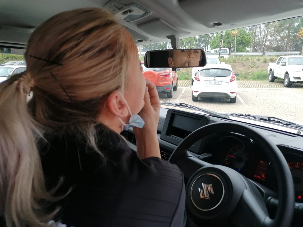 Driving while distracted applying makeup